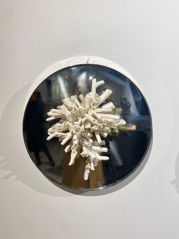 Beyaz Nefes, 2025, Colored porcelain and stainless steel, 1230 degrees, hand-shaped, 40 x 14 cm.